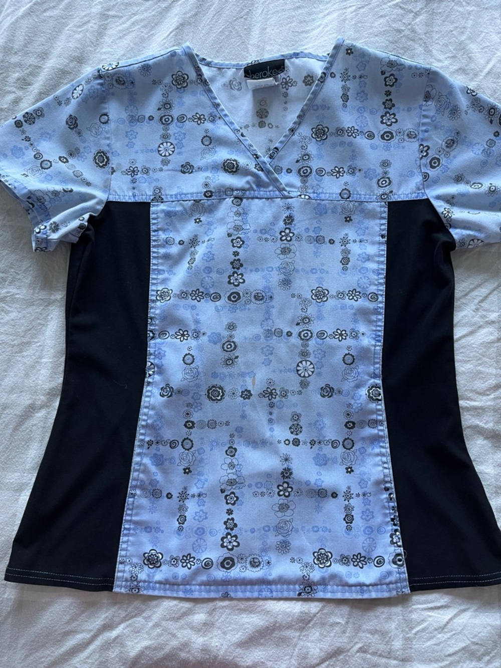 Cherokee Blue Floral Print Scrub Top with Black Side Panels